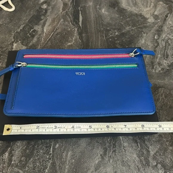 Tumi Clutch with 4 zipper/compartments. - Picture 3 of 3